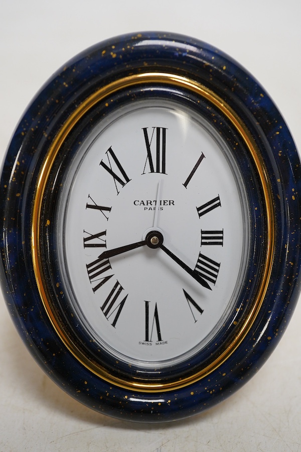 A modern Cartier gilt metal quartz travelling clock. 9cm. Condition - good, not tested as working